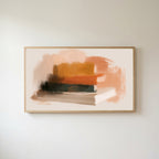 Book stack Frame TV art in an oak frame on a warm white wall