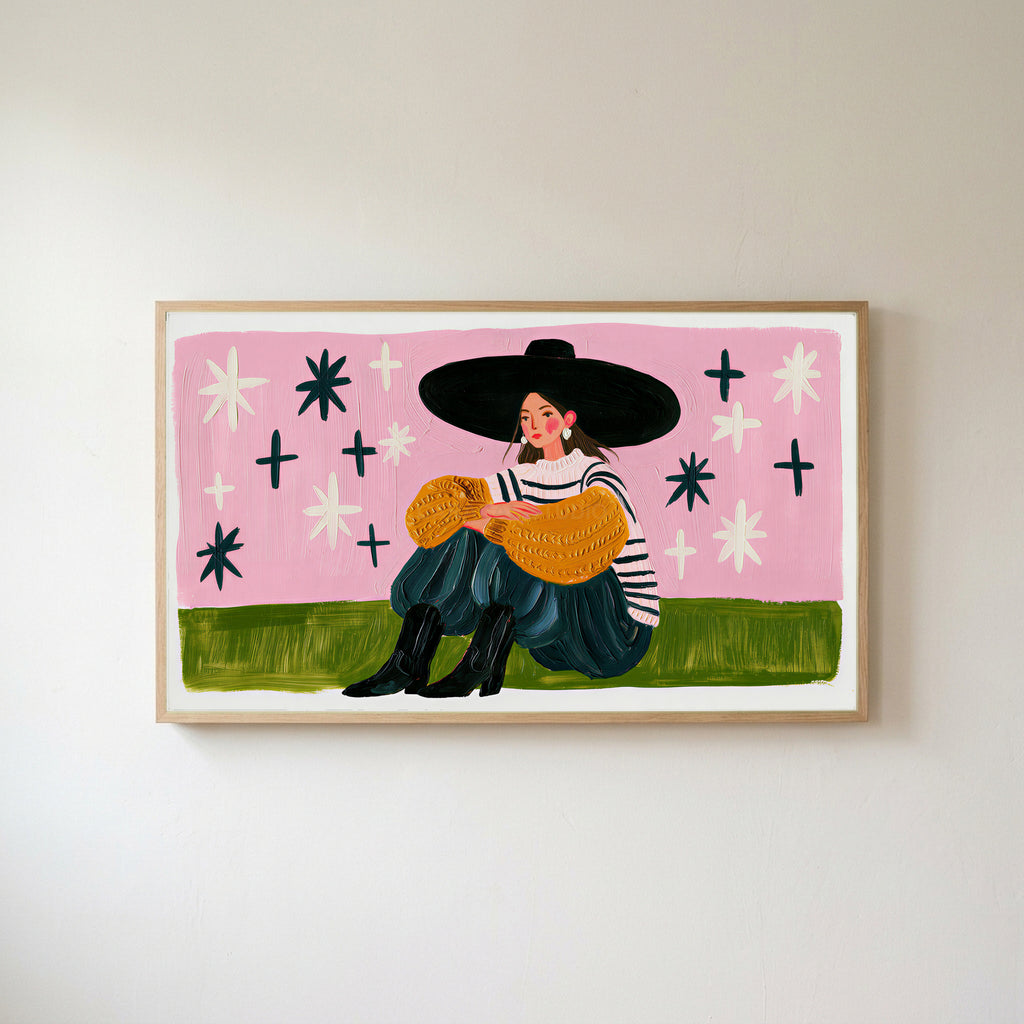 Woman in a big hat Frame TV art in an oak frame on a warm white wall