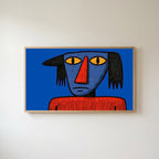 Grumpy naive portrait Frame TV art in an oak frame on a warm white wall