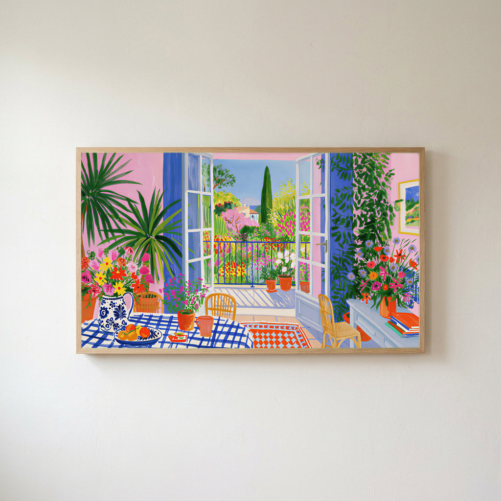 Mediterranean garden view Frame TV art in an oak frame on a warm white wall