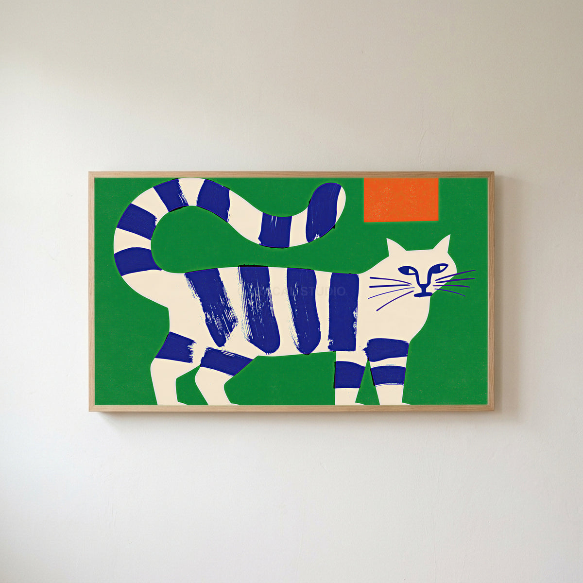 Blue striped cat Frame TV art in an oak frame on a warm white wall