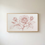 Rose line drawing Frame TV art in an oak frame on a warm white wall