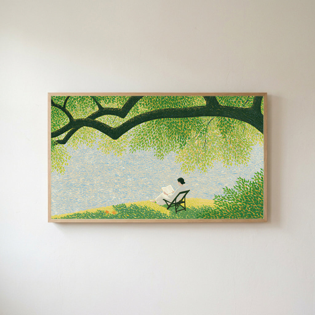 Lake and tree landscape Frame TV art in an oak frame on a warm white wall