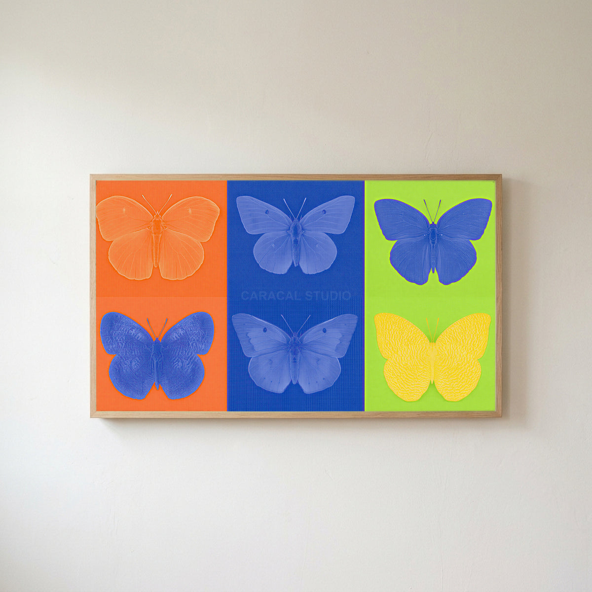 Pop art butterfly Frame TV art in an oak frame on a warm white wall