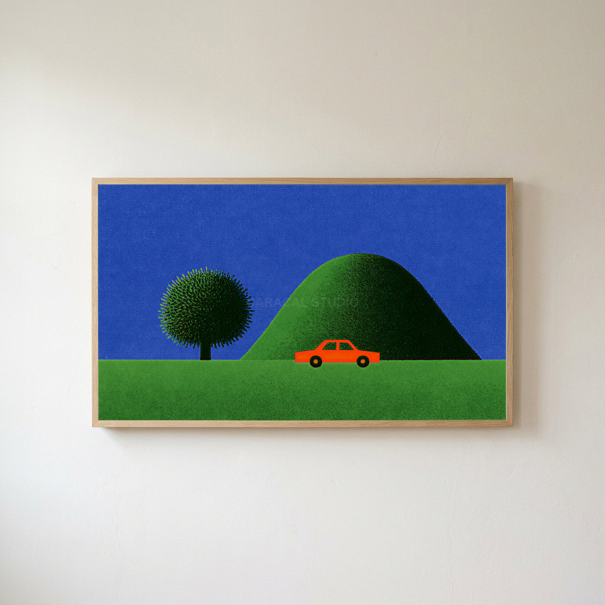 Red car by a green hill Frame TV art in an oak frame on a warm white wall