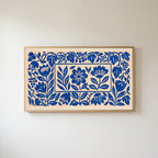 Blue paper cut flowers Frame TV art in an oak frame on a warm white wall