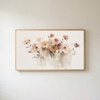 Soft wildflowers Frame TV art in an oak frame on a warm white wall
