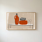 Minimalist table with jug and wine glasses Frame TV art in an oak frame on a warm white wall