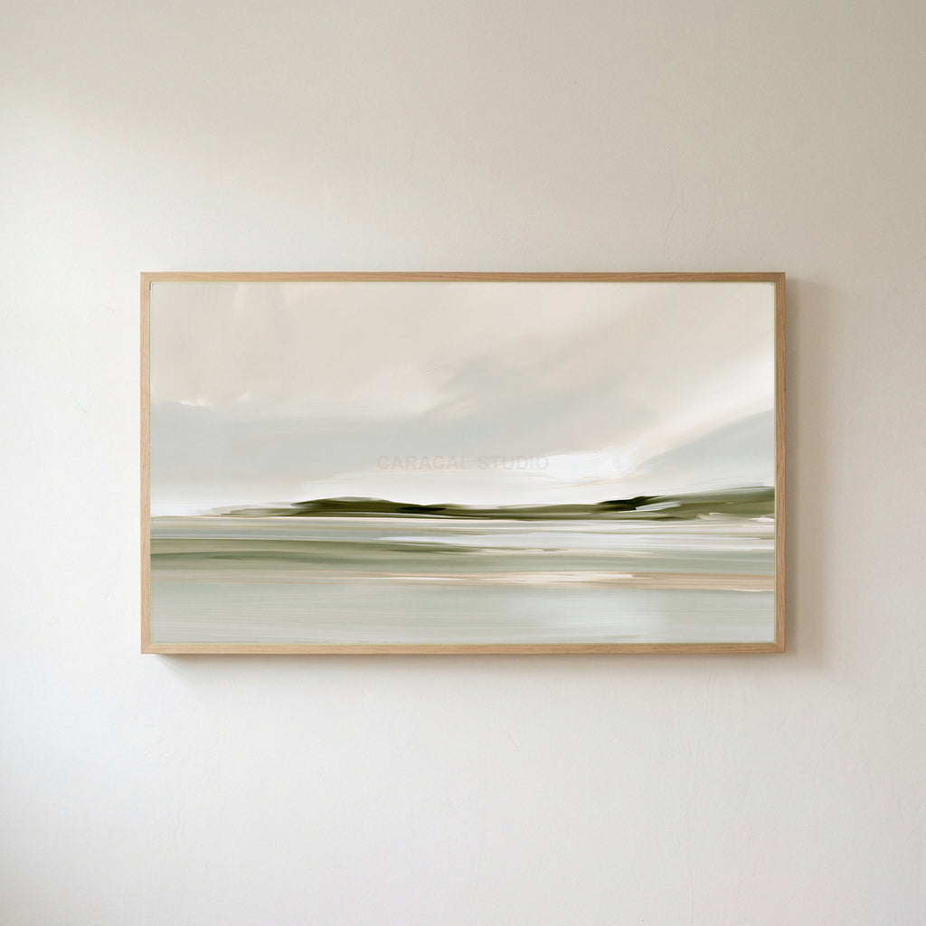 Misty sage shoreline Frame TV art in an oak frame on a warm white wall