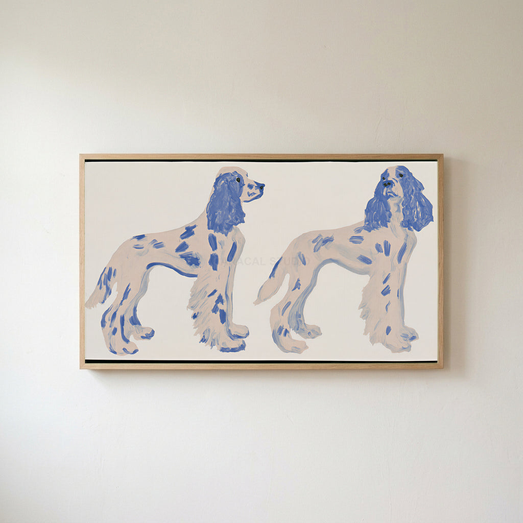 Spaniel figurines Frame TV art in an oak frame on a warm white wall