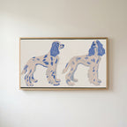 Spaniel figurines Frame TV art in an oak frame on a warm white wall