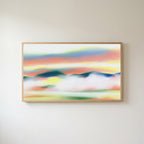 Abstract sunset hills Frame TV art in an oak frame on a warm white wall