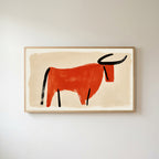 Minimalist bull Frame TV art in an oak frame on a warm white wall