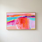 Pink abstract horizon Frame TV art in an oak frame on a warm white wall