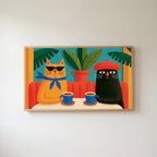 Funny cafe cats Frame TV art in an oak frame on a warm white wall