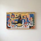 Folk art Christmas dinner Frame TV art in an oak frame on a warm white wall