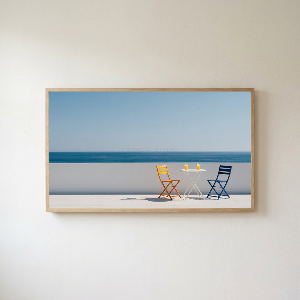 Ocean view terrace Frame TV art in an oak frame on a warm white wall