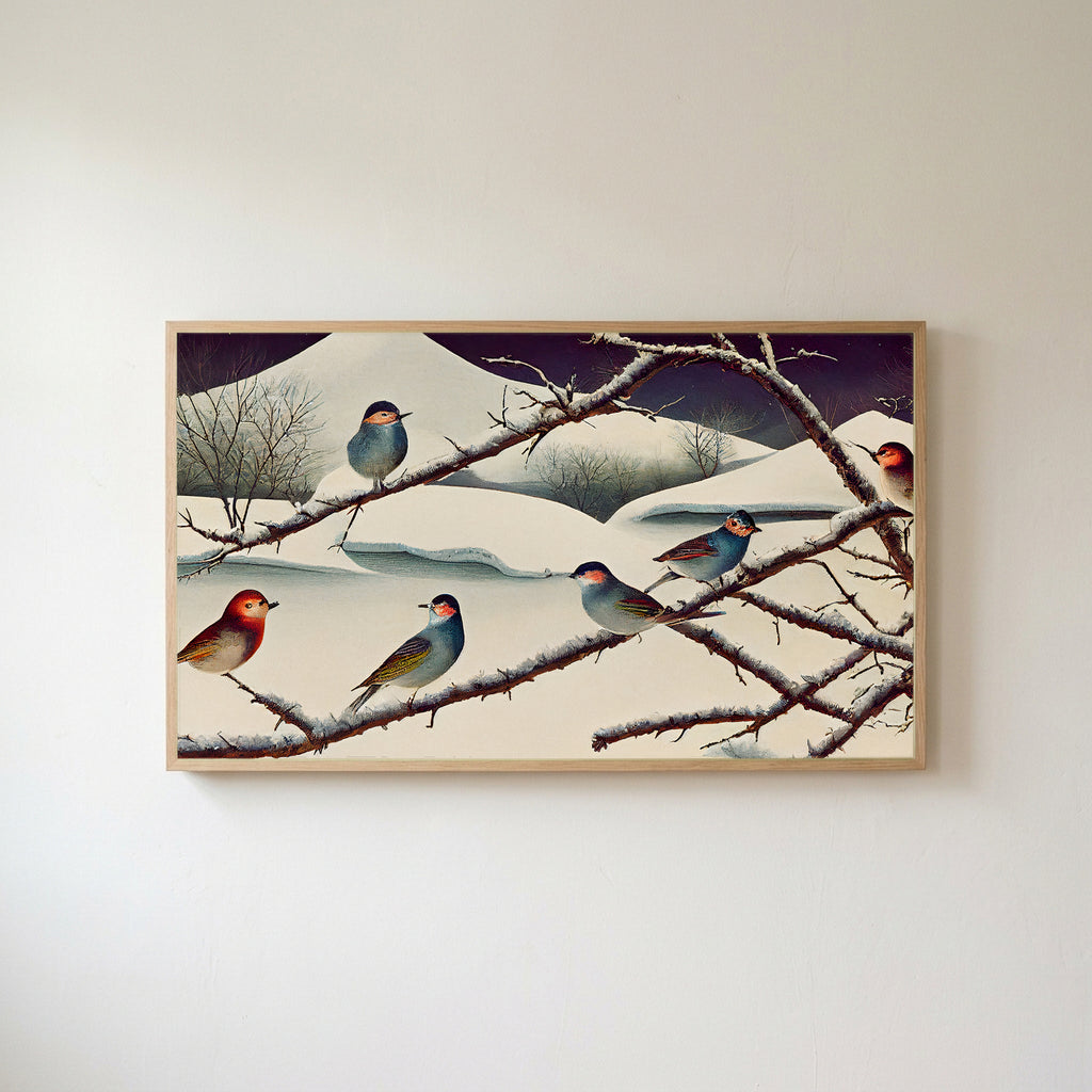 Songbirds on snowy branches Frame TV art in an oak frame on a warm white wall