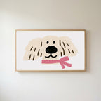 Puppy with a pink scarf Frame TV art in an oak frame on a warm white wall