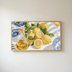 Lemons and olive oil Frame TV art in an oak frame on a warm white wall