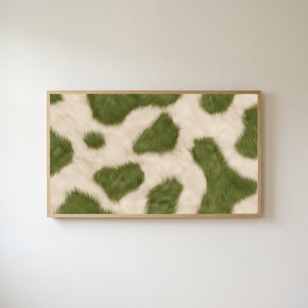 Olive cowhide Frame TV art in an oak frame on a warm white wall