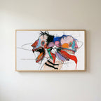 Expressive faces Frame TV art in an oak frame on a warm white wall