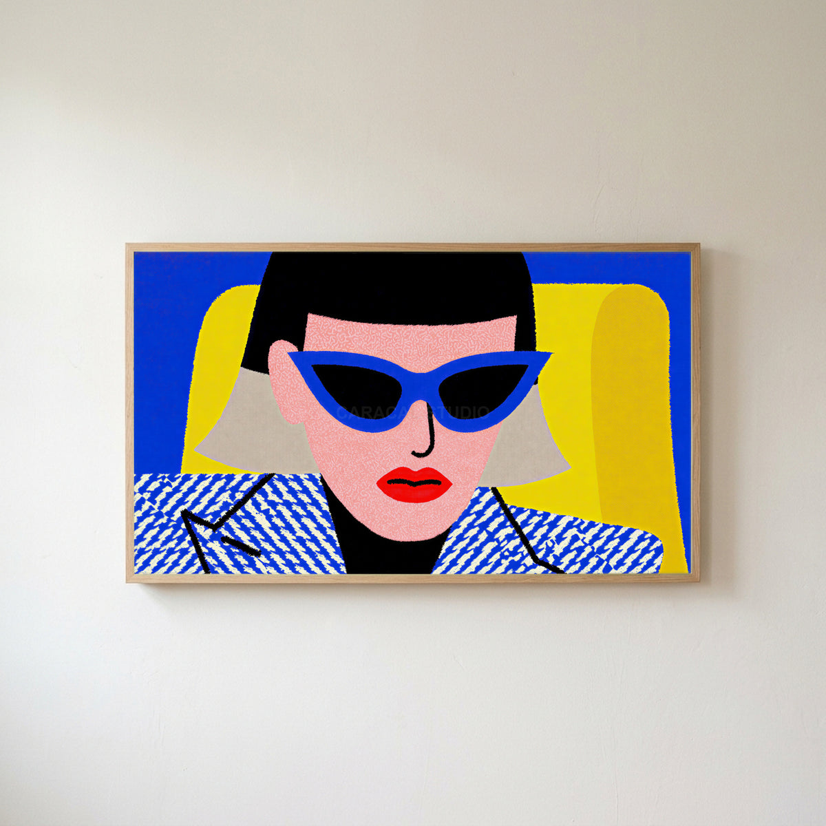 Pop art woman in sunglasses Frame TV art in an oak frame on a warm white wall