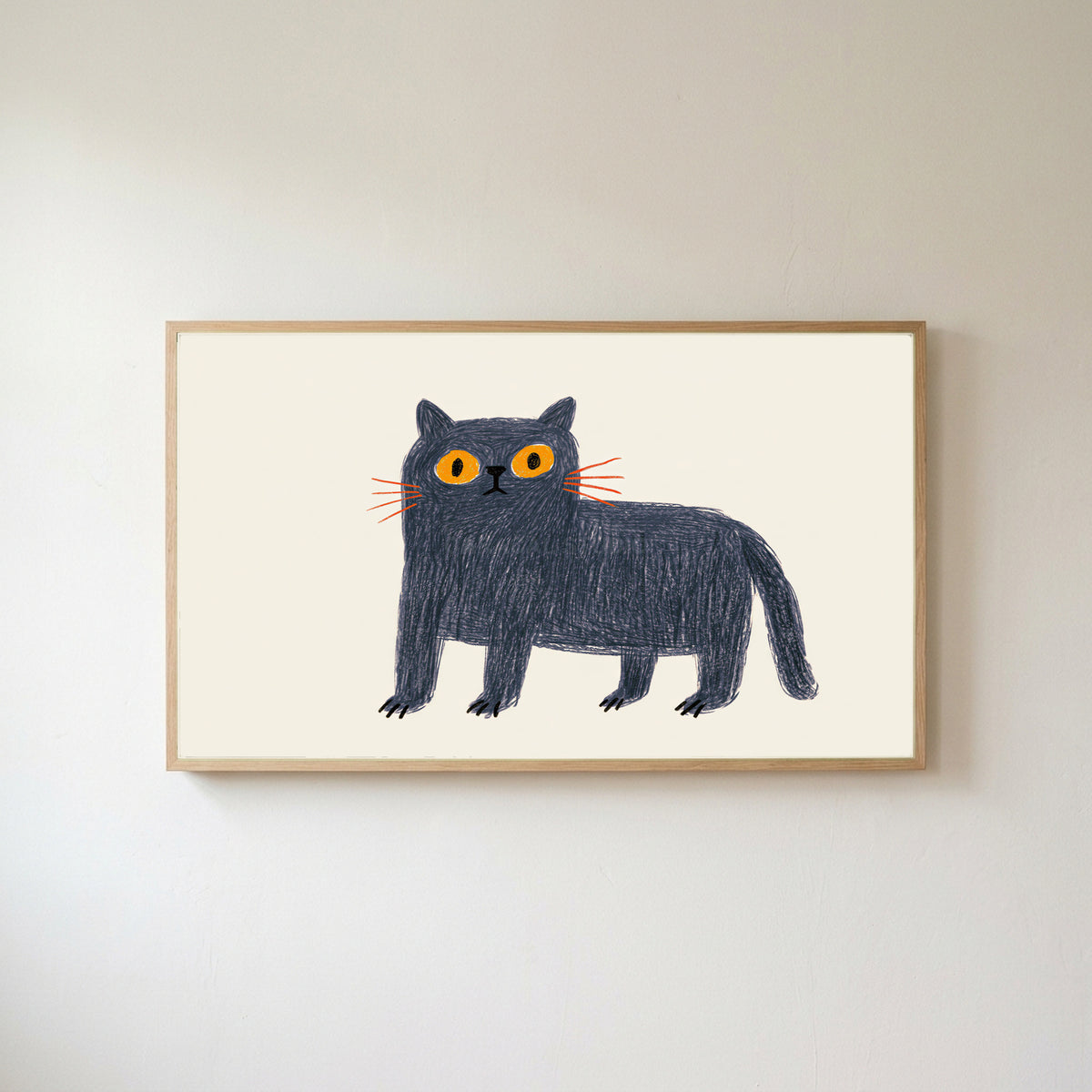 British Blue cat Frame TV art in an oak frame on a warm white wall