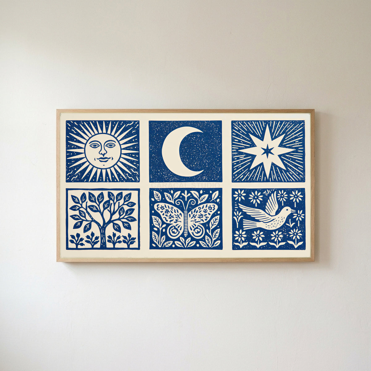 Celestial folk Frame TV art in an oak frame on a warm white wall