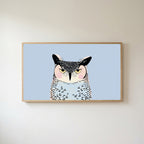 Grumpy owl Frame TV art in an oak frame on a warm white wall