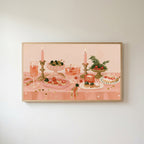 Party table still life Frame TV art in an oak frame on a warm white wall