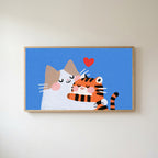 Two cats with a heart Frame TV art in an oak frame on a warm white wall