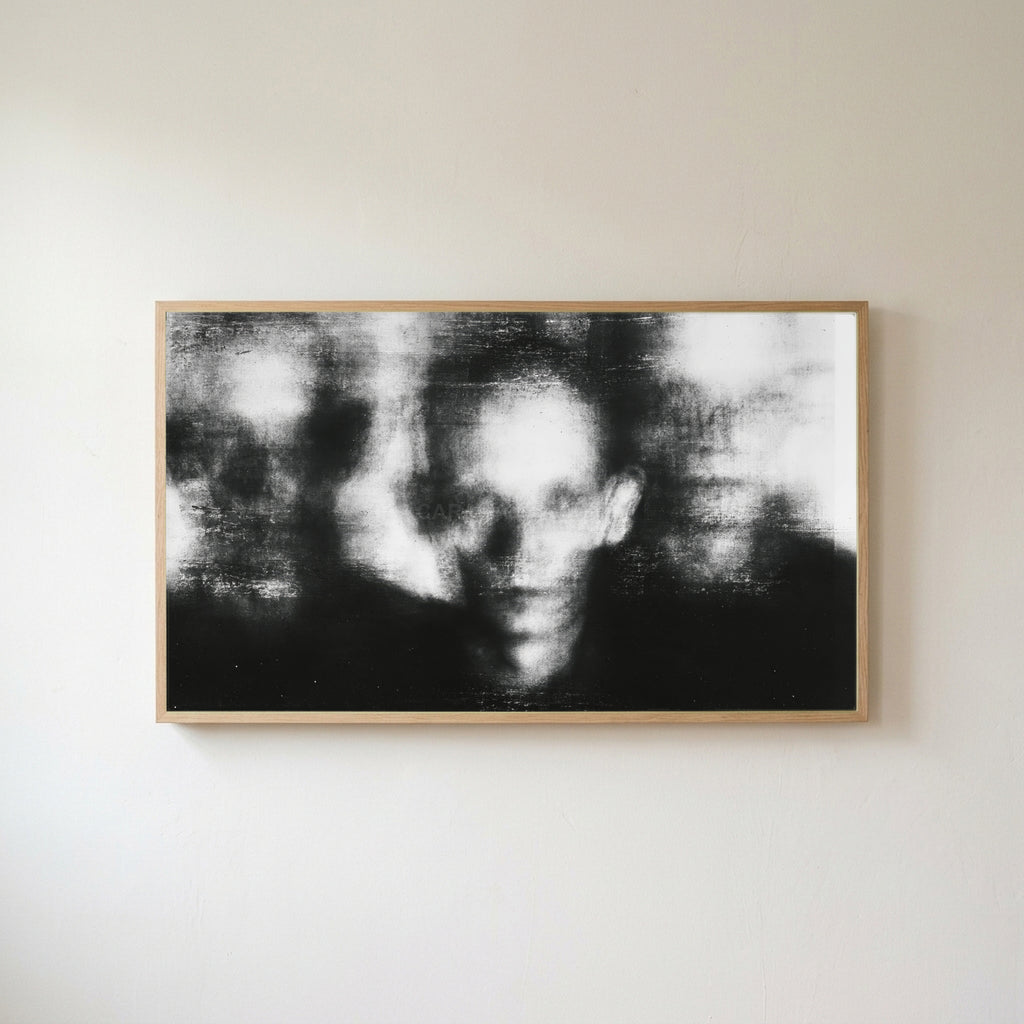 Blurred faces Frame TV art in an oak frame on a warm white wall