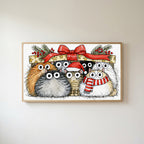 Cats under a gift box Frame TV art in an oak frame on a warm white wall