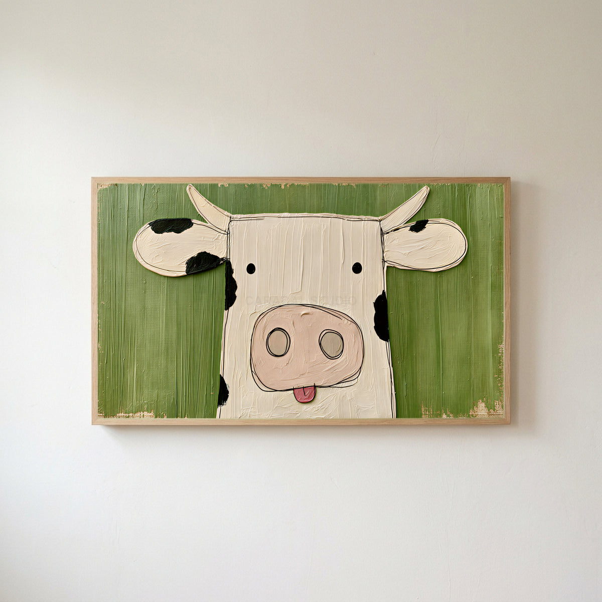 Funny cow Frame TV art in an oak frame on a warm white wall