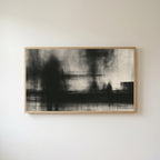 Black and white abstract Frame TV art in an oak frame on a warm white wall