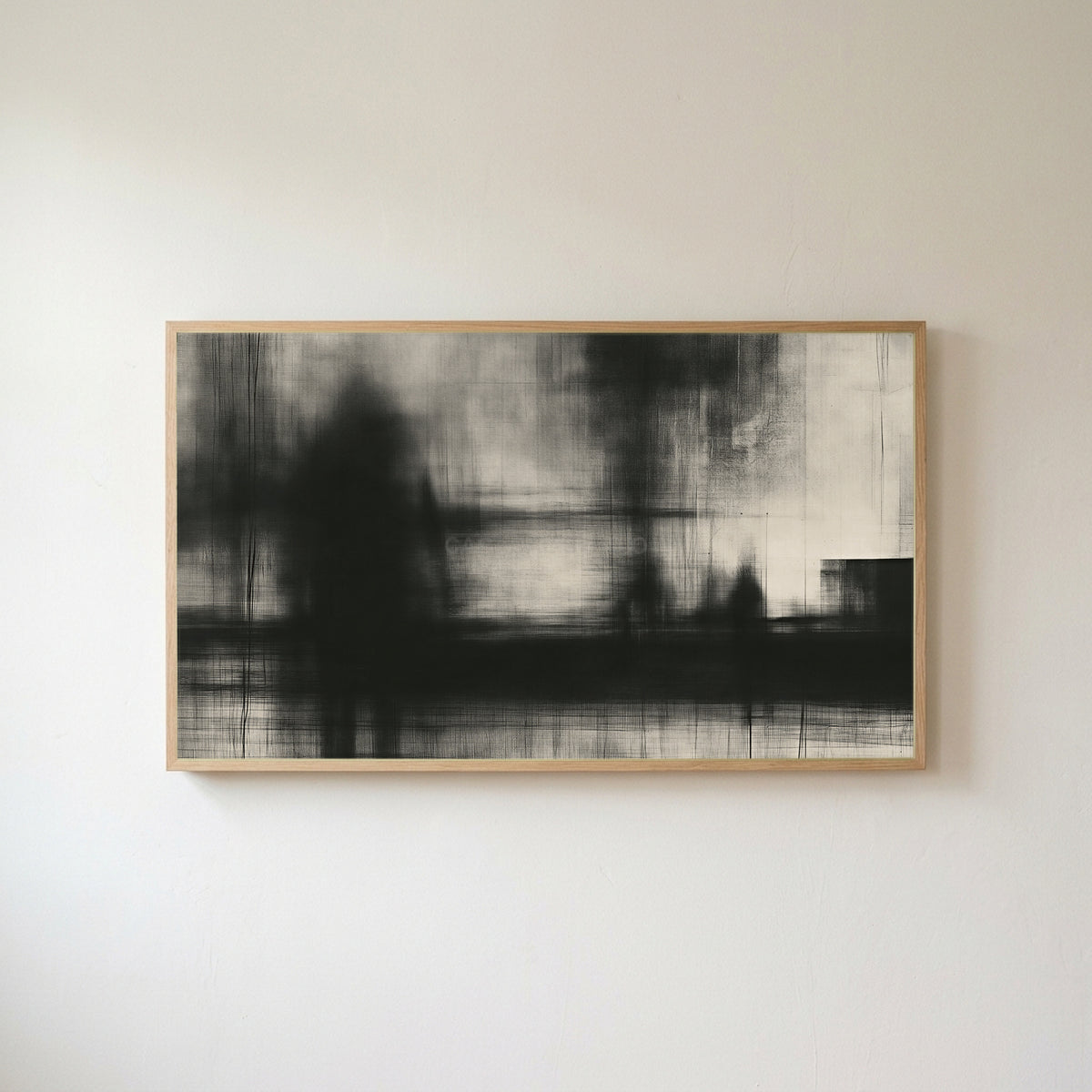 Black and white abstract Frame TV art in an oak frame on a warm white wall
