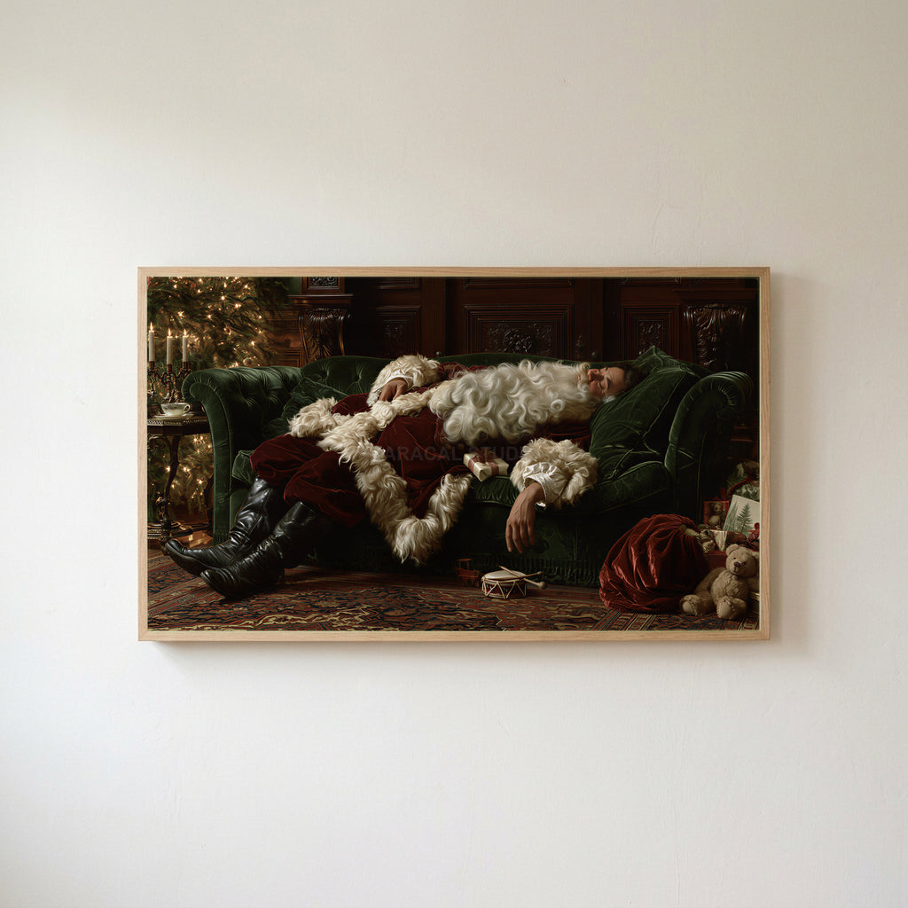 Sleeping Santa Frame TV art in an oak frame on a warm white wall