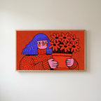 Blue hair portrait Frame TV art in an oak frame on a warm white wall