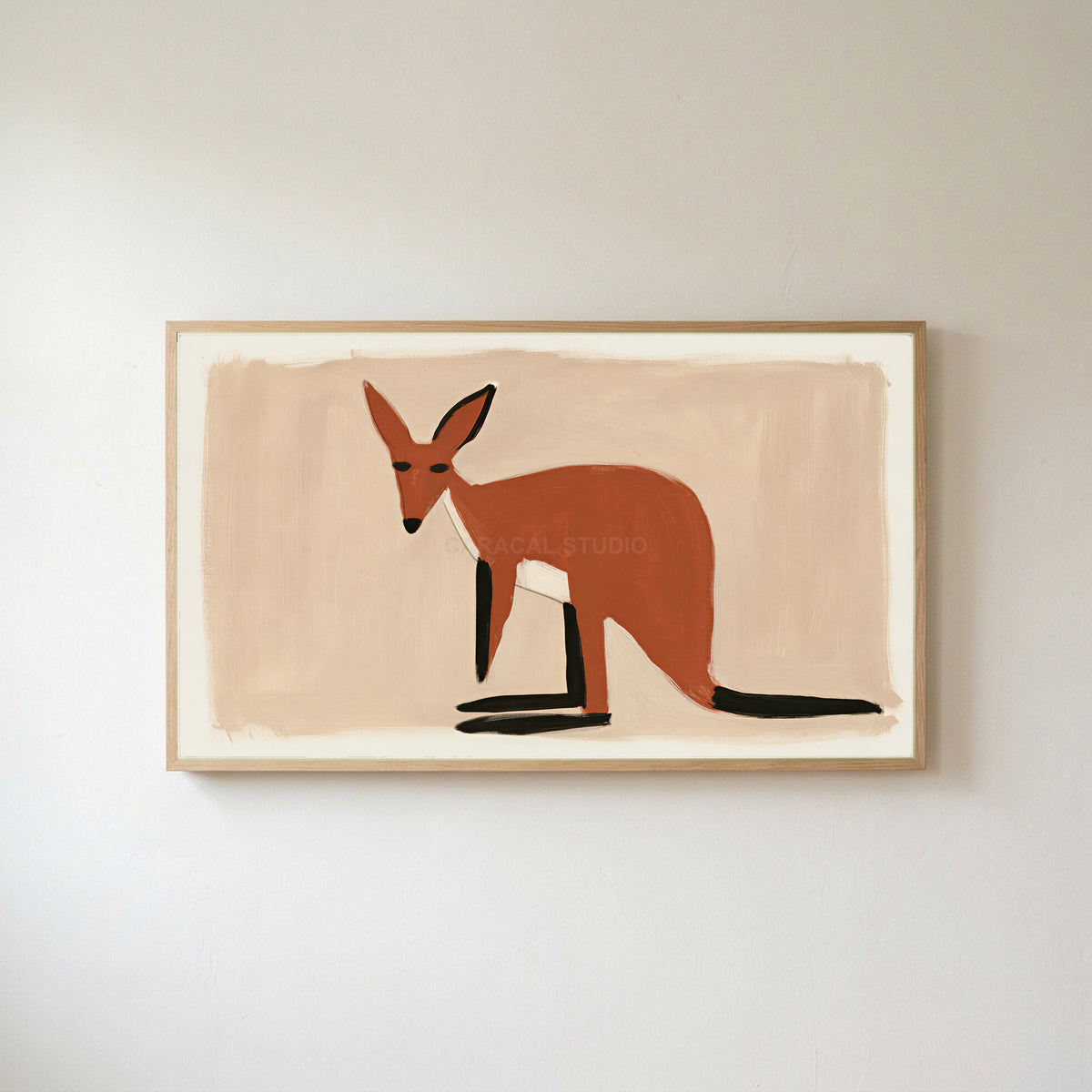 Minimalist wallaby Frame TV art in an oak frame on a warm white wall