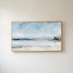 Snowy landscape Frame TV art in an oak frame on a warm white wall