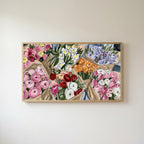 Flower bouquets Frame TV art in an oak frame on a warm white wall
