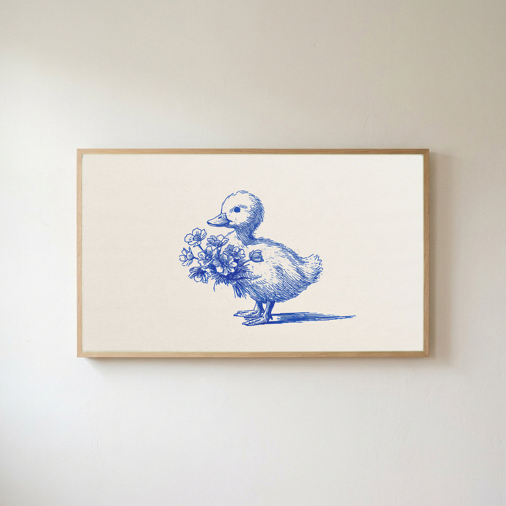 Duckling Frame TV art in an oak frame on a warm white wall