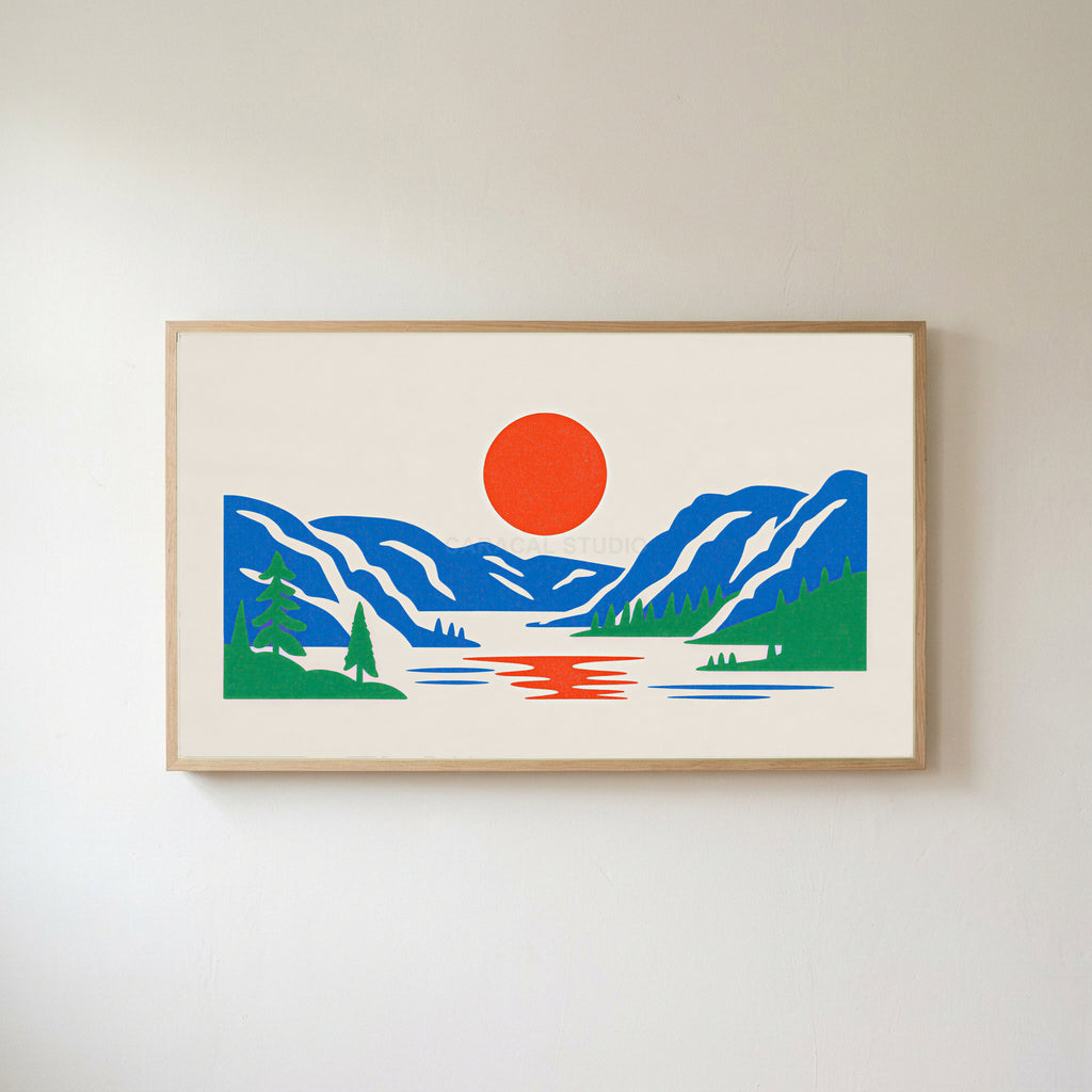 Mountain lake sun Frame TV art in an oak frame on a warm white wall