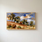 Hillside trees Frame TV art in an oak frame on a warm white wall