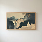 Moody abstract cliffs Frame TV art in an oak frame on a warm white wall