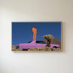 Pink car in the desert Frame TV art in an oak frame on a warm white wall