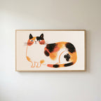 Calico cat Frame TV art in an oak frame on a warm white wall