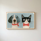 Dog and cat Frame TV art in an oak frame on a warm white wall