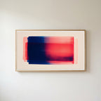 Color field Frame TV art in an oak frame on a warm white wall
